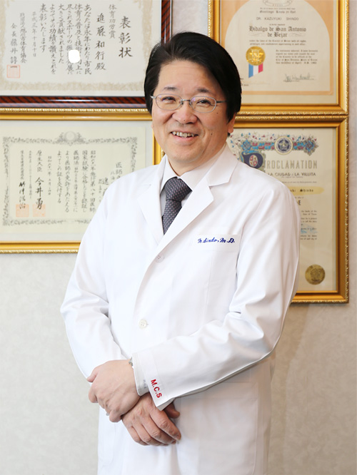 進藤 正明
